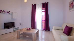 Μια τηλεόραση ή/και κέντρο ψυχαγωγίας στο Apartment close to Fort Saint Angelo