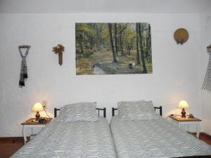 Postel nebo postele na pokoji v ubytování Chez Basile