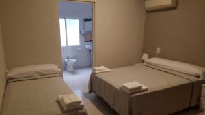 Postel nebo postele na pokoji v ubytování Hotel Castellverd