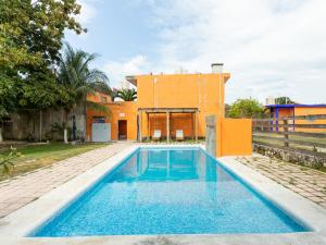 Bazén v ubytování Hotel Hacienda Bacalar nebo v jeho okolí