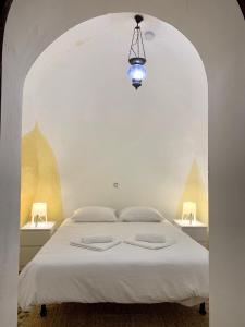 Voodi või voodid majutusasutuse Casa Cueva Castillo toas