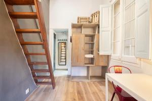 A kitchen or kitchenette at Aqua Apartment by Olala Homes