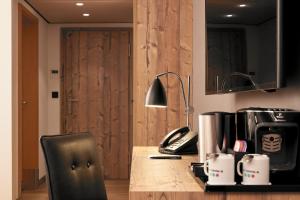 Kuchyň nebo kuchyňský kout v ubytování HYPERION Hotel Garmisch - Partenkirchen