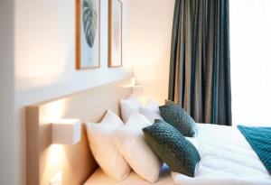 Cama ou camas em um quarto em Hotel Suisse