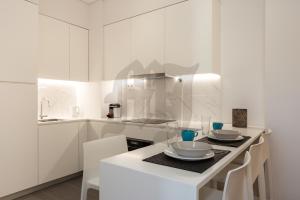 Η κουζίνα ή μικρή κουζίνα στο Morgan-Jupiter Apartments +269 φωτογραφίες