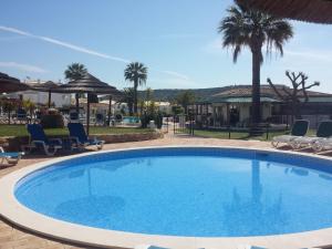 Poolen vid eller i närheten av Luz Ocean Club Apartments