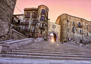 a large building with stairs in front of it at b&b Antiche Dimore Taurasi in Taurasi