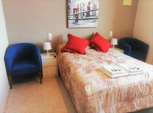 Postel nebo postele na pokoji v ubytování Hotel Castellverd