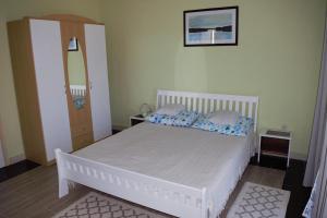 Un pat sau paturi într-o cameră la Apartments Japuncic