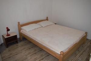 Postel nebo postele na pokoji v ubytování Apartments Japuncic