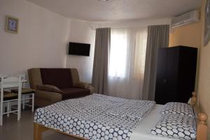 TV a/nebo společenská místnost v ubytování Apartments Japuncic