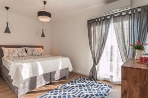 Postel nebo postele na pokoji v ubytování Villa O'Zrna