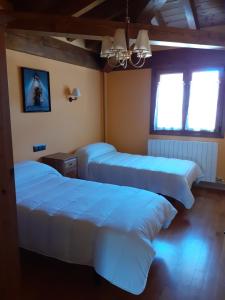 Postel nebo postele na pokoji v ubytování Casa Rural Izarrak