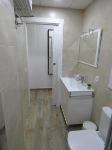 Koupelna v ubytování Living Sevilla Apartments Hércules