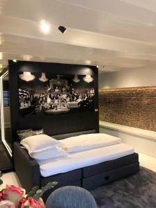 Katil atau katil-katil dalam bilik di Luxury Canal Suite De Heren