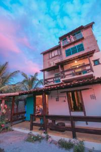 a person standing in front of a building at hostel Mama Africa 2 in Gamboa