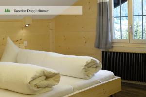 Voodi või voodid majutusasutuse Hotel Waldrand toas