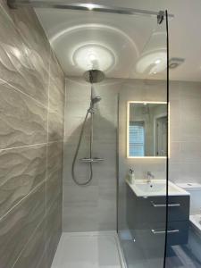 a bathroom with a shower and a sink at Womack Lodge in Saint Helens