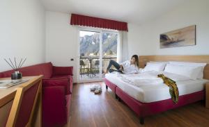 Postel nebo postele na pokoji v ubytování Hotel Al Maso