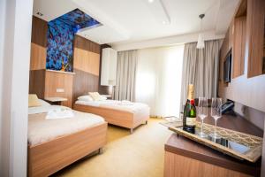 Postel nebo postele na pokoji v ubytování Hotel Herceg