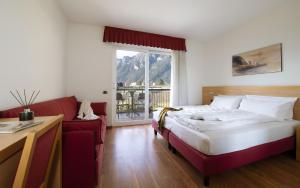 Postel nebo postele na pokoji v ubytování Hotel Al Maso