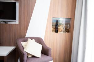 TV a/nebo společenská místnost v ubytování Hotel Herceg