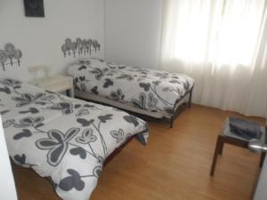 Posteľ alebo postele v izbe v ubytovaní Villas Aloha Valdelagrana