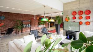 TV a/nebo společenská místnost v ubytování Hotel Marina