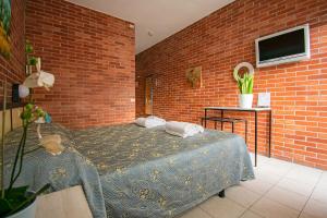 Postel nebo postele na pokoji v ubytování Hotel Marina