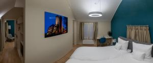 Una cama o camas en una habitación de Péitche Lauer