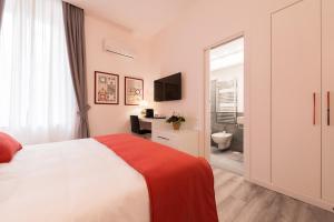 A bed or beds in a room at Napoliving