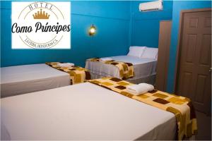 Voodi või voodid majutusasutuse Hotel Como Principes toas