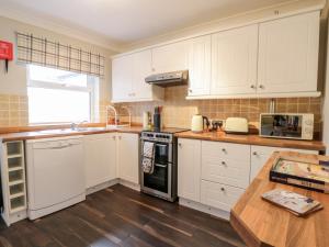 Kuchyň nebo kuchyňský kout v ubytování Scarborough Cottage + 5 fotografií