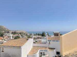 vistas a la ciudad desde los tejados de los edificios en Fournier Apartment - Praia da Luz, en Luz