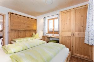 Posteľ alebo postele v izbe v ubytovaní Ferienhaus Widauer Herzoghof