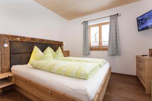 Posteľ alebo postele v izbe v ubytovaní Ferienhaus Widauer Herzoghof