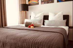 Ein Bett oder Betten in einem Zimmer der Unterkunft Boutique Hotel Selb
