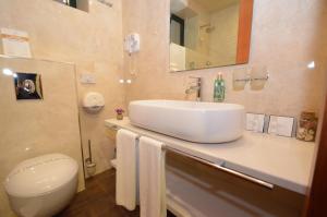 Koupelna v ubytování Hotel Porto In