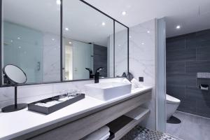 Koupelna v ubytování KEEBE Hotel + 33 fotografií
