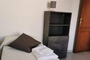 Letto o letti in una camera di Fine Apartment in Tuscia Centro Storico Viterbo