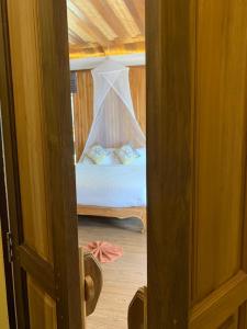 Postel nebo postele na pokoji v ubytování Thiwson Beach Resort - SHA Extra Plus