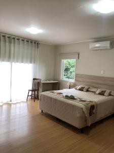 Katil atau katil-katil dalam bilik di Hotel Carpevita