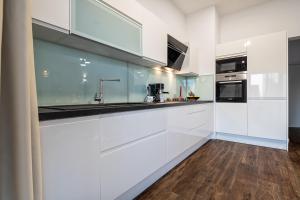 Kuchyňa alebo kuchynka v ubytovaní Iva Apartment