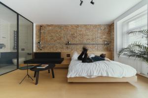 Posteľ alebo postele v izbe v ubytovaní Owntown Apart Hotel