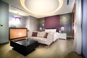 Posezení v ubytování Yen Jim Boutique Motel
