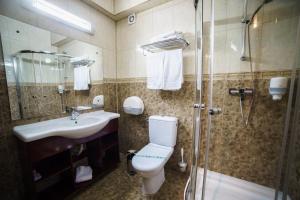 Koupelna v ubytování Grand Hotel Orient Braila