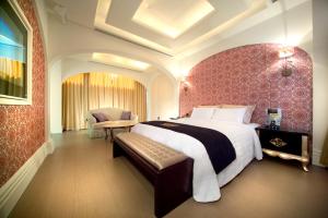 Postel nebo postele na pokoji v ubytování Yen Jim Boutique Motel
