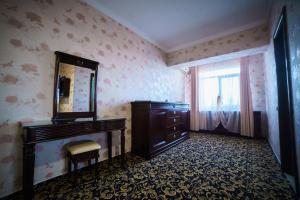 Postel nebo postele na pokoji v ubytování Grand Hotel Orient Braila