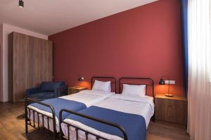Letto o letti in una camera di Mtevino