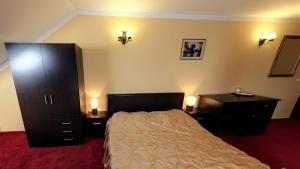 Кровать или кровати в номере La Storia Guest House